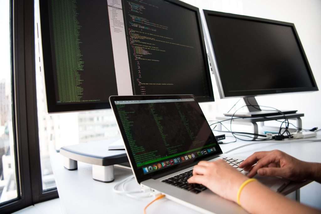 Person Working on Laptop